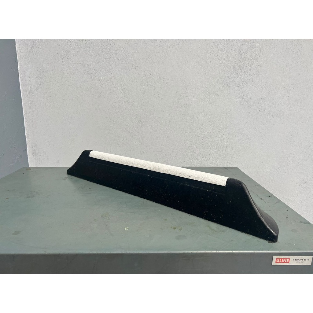 Tope Top It con cinta reflejante blanca, vista de perfil